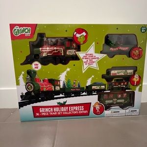 Grinch holiday express 36 piece train set Collectors edition